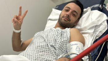 Pouria Zeraati shares photo of himself from hospital bed after being stabbed. Pic: X / @pouriazeraati