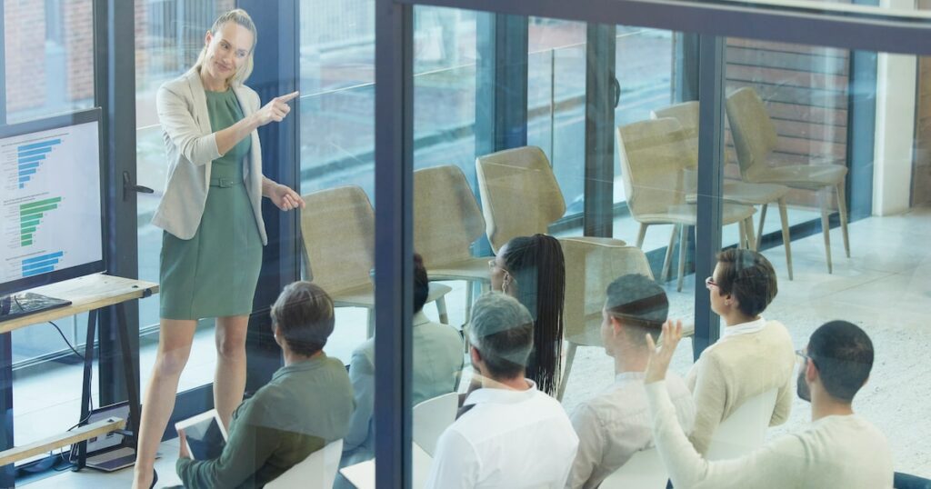 Shot of a young businesswoman giving a presentation at work