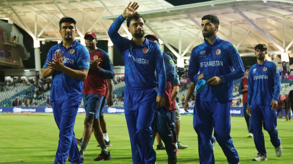 Cricket - T20 World Cup - Semi Final - South Africa v Afghanistan - Brian Lara Stadium, Tarouba, Trinidad and Tobago - June 26, 2024 Afghanistan's Rashid Khan and teammates react after the match REUTERS/Ash Allen