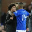 Ashley Young embraces son Tyler Young after full time. Pic: PA