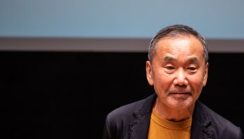 Japanese writer Haruki Murakami attends a press conference during a media preview of The Waseda International House of Literature, also known as Haruki Murakami Library, which is designed by Japanese architect Kengo Kuma, at Waseda University in Tokyo on September 22, 2021. (Photo by Philip FONG / AFP)