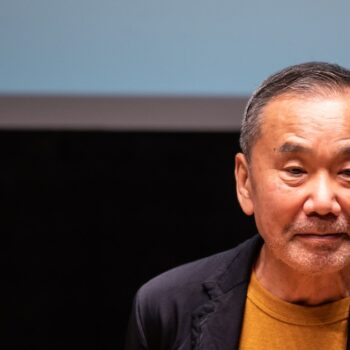 Japanese writer Haruki Murakami attends a press conference during a media preview of The Waseda International House of Literature, also known as Haruki Murakami Library, which is designed by Japanese architect Kengo Kuma, at Waseda University in Tokyo on September 22, 2021. (Photo by Philip FONG / AFP)