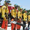 CAMARILLO, CALIFORNIA - JULY 14: Cadets, who were formerly incarcerated, stand with wildland firefighting equipment at the Ventura Training Center (VTC) during an open house demonstration for media and prospective participants on July 14, 2022 in Camarillo, California. The program was developed in 2018 to take formerly incarcerated people, who previously battled fires as California Department of Corrections and Rehabilitation (CDCR) inmate camp members, and train them for a career as professional firefighters. As climate change has stoked increased wildfire behavior in California, there is a surge in demand for trained wildland firefighters across the state. Participants are carefully screened before being accepted to the free 18-month program where they receive a monthly stipend, health insurance, life coaching and mentorship in an effort to reduce recidivism.   Mario Tama/Getty Images/AFP (Photo by MARIO TAMA / GETTY IMAGES NORTH AMERICA / Getty Images via AFP)