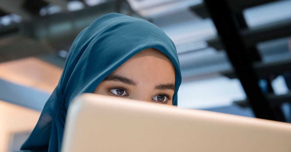 Arab businesswoman using a laptop