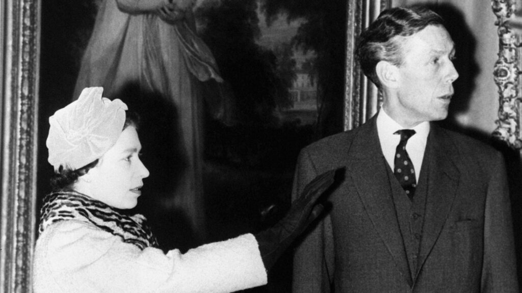 Professor Anthony Blunt with Queen Elizabeth II in 1970. Pic: PA