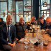 Prince William, second from left, with Aston Villa fans in Wetherspoons. Pic: PA