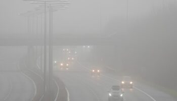 Cars driving in foggy conditions on the M20 near Folkestone in Kent. Picture date: Sunday December 29, 2024. Gareth Fuller/PA Wire