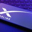 The Starlink logo appears on a smartphone screen in this illustration photo in Reno, United States, on December 20, 2024. (Photo by Jaque Silva/NurPhoto) (Photo by Jaque Silva / NurPhoto / NurPhoto via AFP)