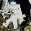 NASA's stuck astronaut steps out for spacewalk