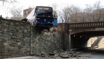 WATCH: City bus comes within inches of disaster on elevated overpass during rush hour