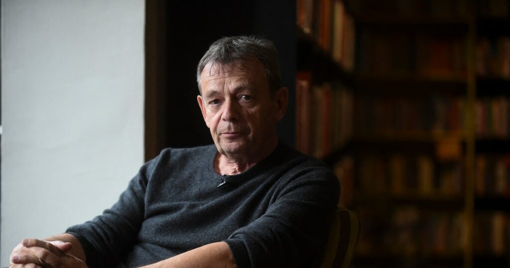 French writer Pierre Lemaitre poses during an interview with AFP in Bogota on April 28, 2017. (Photo by Raul ARBOLEDA / AFP)