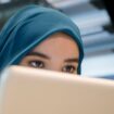 Arab businesswoman using a laptop