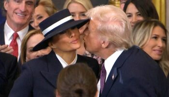 Awkward moment as Trump fails to kiss Melania moments before swearing in