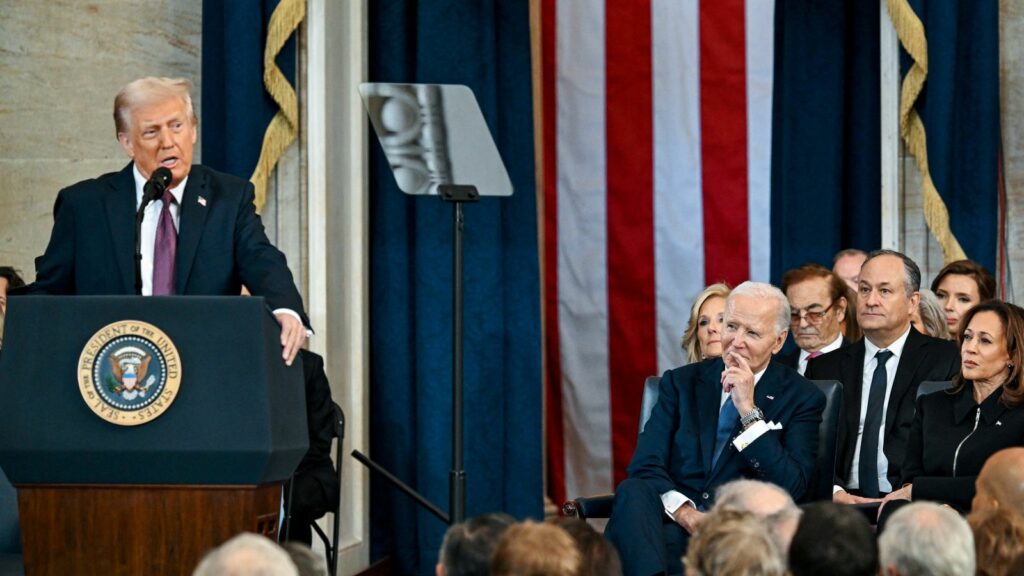 Donald Trump gives his inaugural speech while Joe Biden watches on. Pic: Reuters