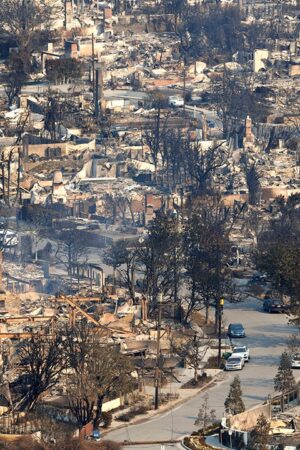 California officials reopen certain Palisades Fire zones, cops to use planes to monitor looting