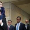 WASHINGTON, DC - DECEMBER 05: Tesla CEO Elon Musk, Co-Chair of the newly announced Department of Government Efficiency (DOGE) carries his son "X" on his shoulders at the U.S. Capitol after a media availability with businessman Vivek Ramaswamy (3rd R), Co-Chair of the newly announced Department of Government Efficiency and Speaker of the House Mike Johnson (4th R) (R-LA) on December 05, 2024 in Washington, DC. Musk and Ramaswamy are meeting with members of the U.S. Congress today about DOGE, a planned presidential advisory commission with the goal of cutting government spending and increasing efficiency in the federal workforce.   Andrew Harnik/Getty Images/AFP (Photo by Andrew Harnik / GETTY IMAGES NORTH AMERICA / Getty Images via AFP)