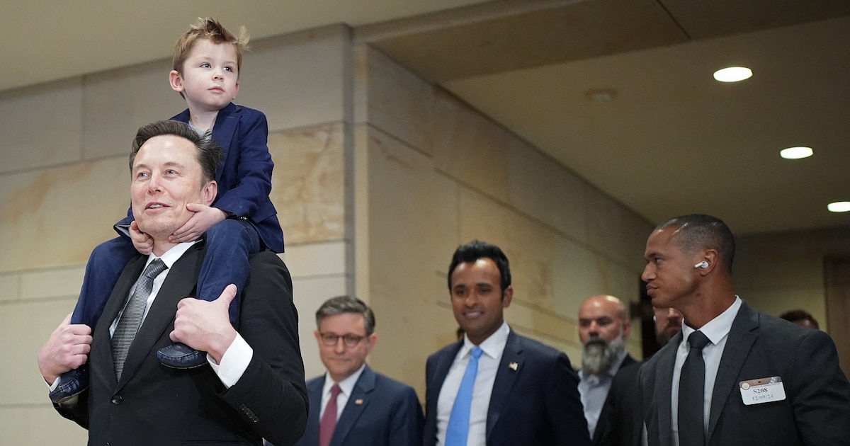 WASHINGTON, DC - DECEMBER 05: Tesla CEO Elon Musk, Co-Chair of the newly announced Department of Government Efficiency (DOGE) carries his son "X" on his shoulders at the U.S. Capitol after a media availability with businessman Vivek Ramaswamy (3rd R), Co-Chair of the newly announced Department of Government Efficiency and Speaker of the House Mike Johnson (4th R) (R-LA) on December 05, 2024 in Washington, DC. Musk and Ramaswamy are meeting with members of the U.S. Congress today about DOGE, a planned presidential advisory commission with the goal of cutting government spending and increasing efficiency in the federal workforce.   Andrew Harnik/Getty Images/AFP (Photo by Andrew Harnik / GETTY IMAGES NORTH AMERICA / Getty Images via AFP)