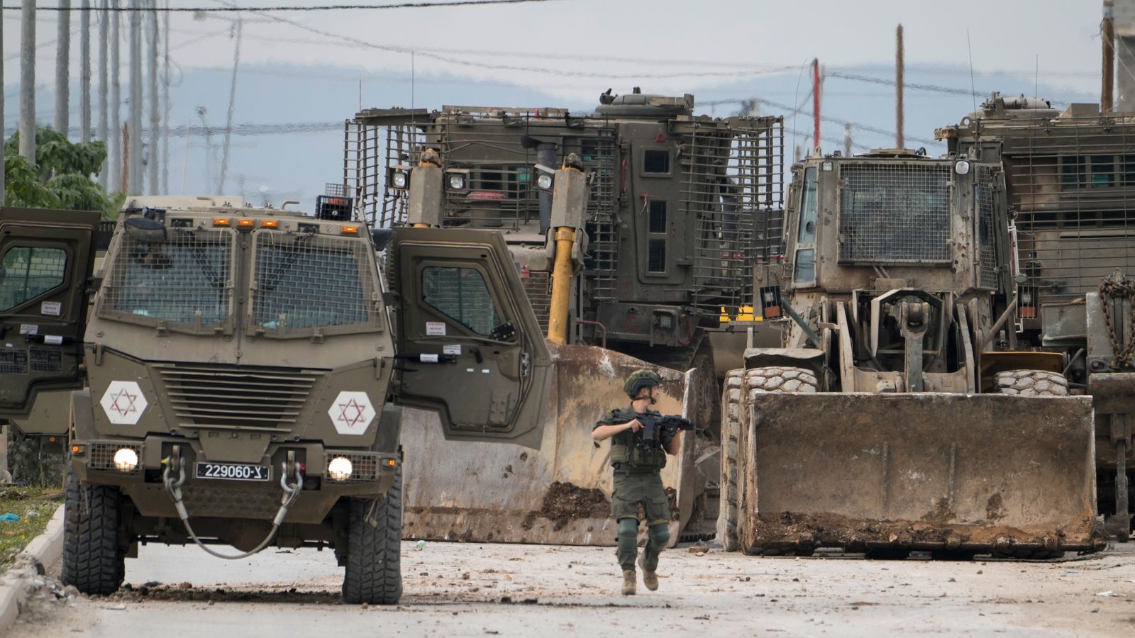 Israeli army vehicles in the West Bank city of Jenin on 22 January. Pic: AP