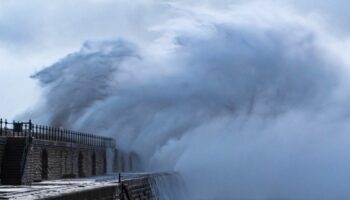 Waves crash over Tynemouth Pier during Storm Darragh in December. Pic: AP