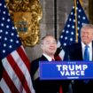 PALM BEACH, FLORIDA - DECEMBER 16: SoftBank CEO Masayoshi Son (C), accompanied by U.S. President-elect Donald Trump (R) and Trump's choice for Secretary of Commerce, Cantor Fitzgerald Chairman and CEO Howard Lutnick (L), speaks at a news conference at Trump's Mar-a-Lago resort on December 16, 2024 in Palm Beach, Florida. In a news conference that went over an hour, Trump announced that SoftBank will invest over $100 billion in projects in the United States including 100,000 artificial intelligence related jobs and then took questions on Syria, Israel, Ukraine, the economy, cabinet picks, and many other topics.   Andrew Harnik/Getty Images/AFP (Photo by Andrew Harnik / GETTY IMAGES NORTH AMERICA / Getty Images via AFP)