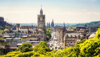 A high angle view over central Edinburgh, with Princes Street busy with pedestrians on a sunny afternoon. Pic: iStock