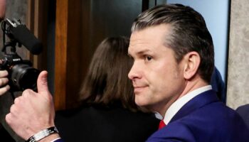 Pete Hegseth, U.S. President-elect Donald Trump's nominee to be secretary of defense, gives a thumbs-up as he leaves a Senate Committee on Armed Services confirmation hearing on Capitol Hill in Washington, U.S., January 14, 2025. REUTERS/Evelyn Hockstein