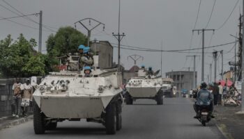 UN armoured personnel carriers deploy outside Goma in the Democratic Republic of Congo on Saturday. Pic: AP