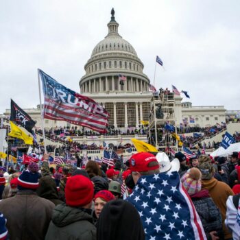 FILE - Rioters loyal to President Donald Trump rally at the U.S. Capitol in Washington, Jan. 6, 2021. (AP Photo/Jose Luis Magana, File)