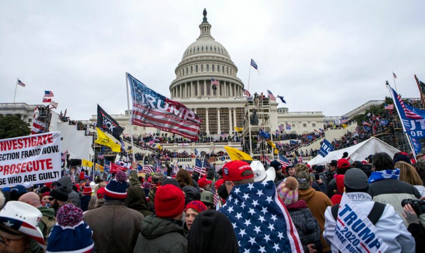 FILE - Rioters loyal to President Donald Trump rally at the U.S. Capitol in Washington, Jan. 6, 2021. (AP Photo/Jose Luis Magana, File)