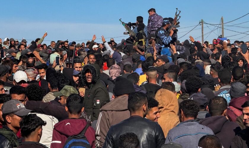 Displaced Palestinians wait to be allowed to return to their homes in northern Gaza, in the central Gaza Strip