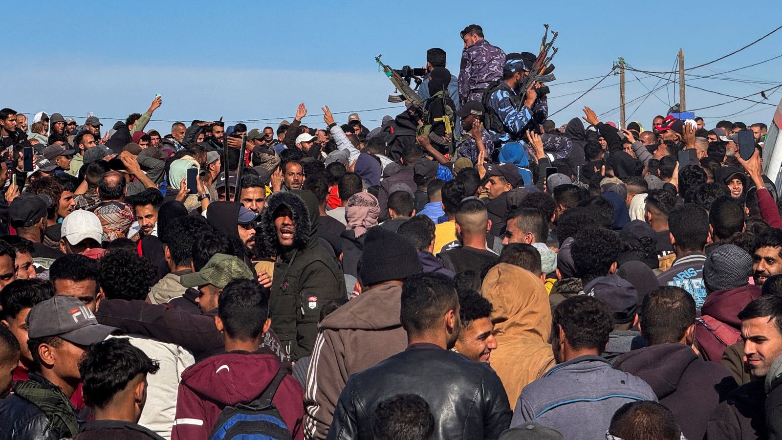 Displaced Palestinians wait to be allowed to return to their homes in northern Gaza, in the central Gaza Strip