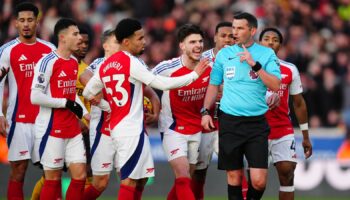 File photo dated 25/01/25 of Michael Oliver surrounded by Arsenal players after sending off Myles Lewis-Skelly . A referee support group fears “even worse is just around the corner” after Premier League referee Michael Oliver was the target of threats and abuse over the weekend. Issue date: Monday January 27, 2025.