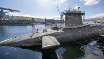 Vanguard-class submarine HMS Vigilant, one of the UK's four nuclear warhead-carrying submarines at HM Naval Base Clyde, Faslane, west of Glasgow, Scotland on April 29, 2019. A tour of the submarine was arranged to mark fifty years of the continuous, at sea nuclear deterrent. (Photo by James Glossop / POOL / AFP)