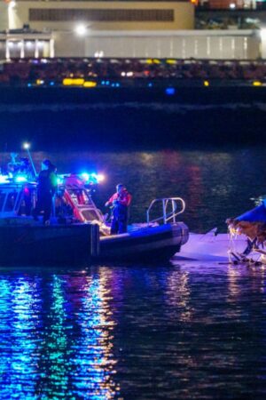 Passenger plane and helicopter crash into river after mid-air collision in DC