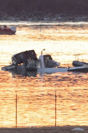 Emergency personnel at the site of the crash. Pic: Reuters