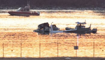 Emergency personnel at the site of the crash. Pic: Reuters