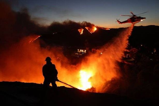 BREAKING: Los Angeles wildfires: At least 10 people dead as death toll doubles in 'apocalyptic' scenes