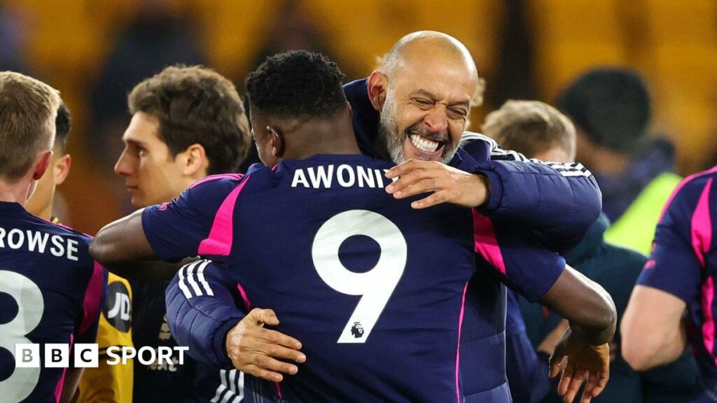 Nuno Espirito Santo celebrates Nottingham Forest's win with Taiwo Awoniyi.