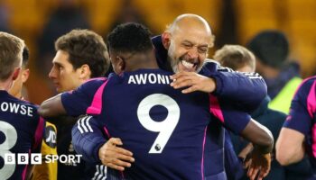 Nuno Espirito Santo celebrates Nottingham Forest's win with Taiwo Awoniyi.