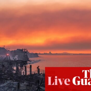 California fires live: progress made against some LA blazes but thickening smoke prompts ‘health emergency’