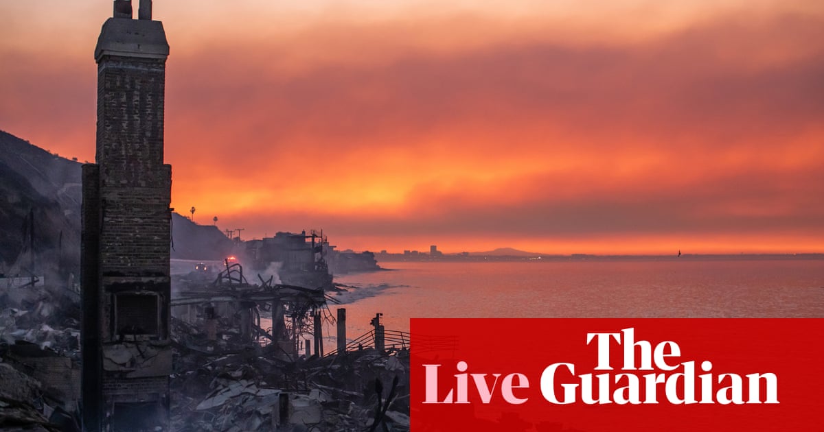 California fires live: progress made against some LA blazes but thickening smoke prompts ‘health emergency’