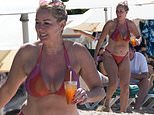 Carefree Claire Sweeney, 53, hits the beach in colourful bikini in sunny Barbados as she moves on from Ricky Hatton split