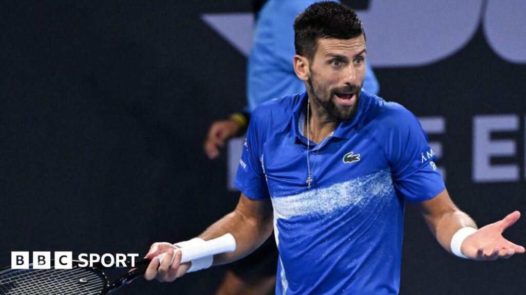 Serbia's Novak Djokovic reacts during his men's singles quarter-final match against USA's Reilly Opelka at the Brisbane International.