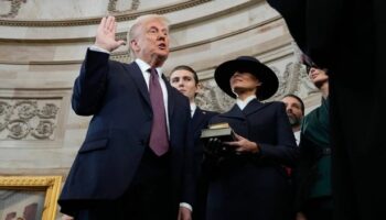 Donald Trump inauguration gaffe sees President recite oath without putting his hand on Bible