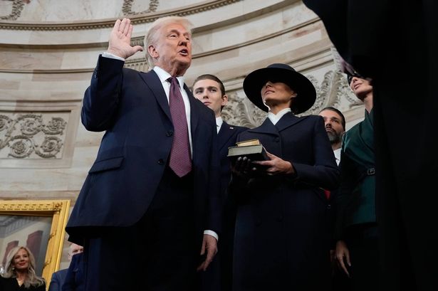 Donald Trump inauguration gaffe sees President recite oath without putting his hand on Bible