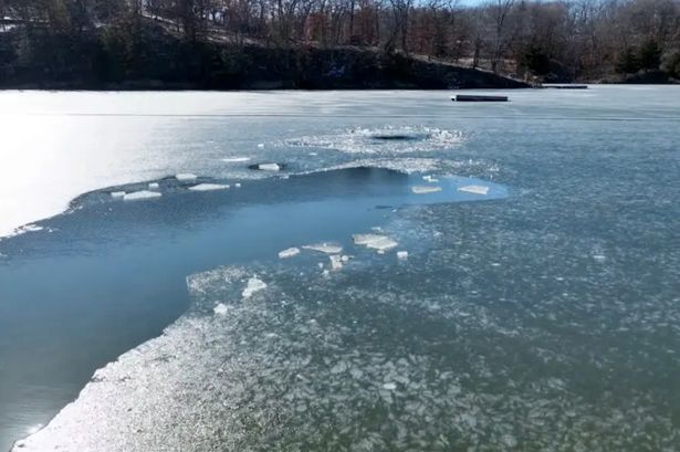 Drone search ends in tragedy after two children discovered trapped beneath frozen lake