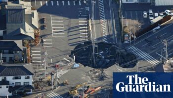 Fears grow in Japan for truck driver trapped in sinkhole for third day