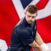 Billy Harris hits a backhand return during Great Britain's United Cup tie against Poland