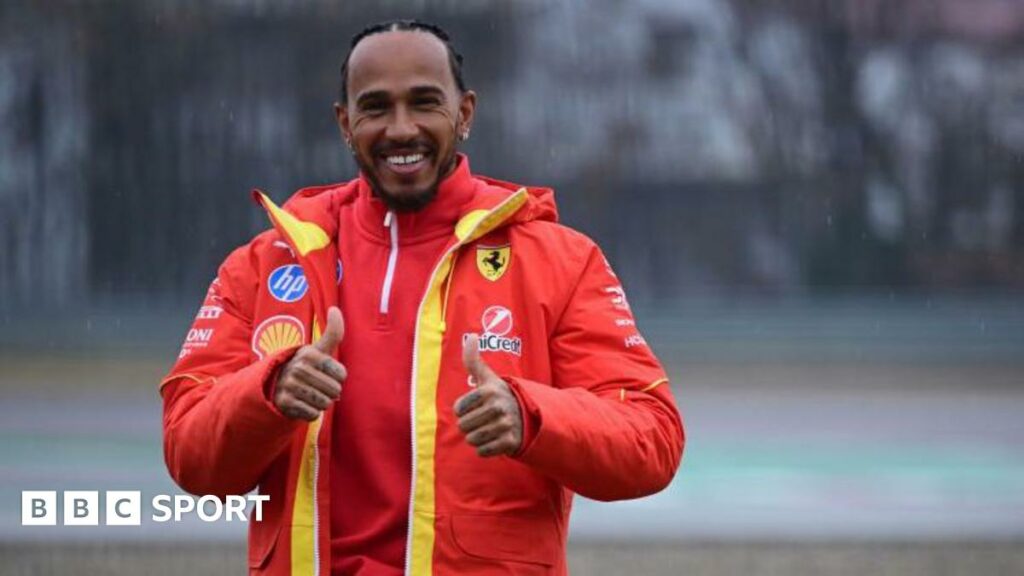 Lewis Hamilton giving a thumbs up after his first Ferrari test drive