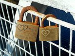 Heartbreak as dozens of engraved padlocks placed by lovers are cut off an iconic suspension bridge